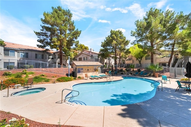 3060 Tarpon Dr Unit 104, Las Vegas, NV 89120 - community pool featuring a patio area, a hot tub, and a residential view