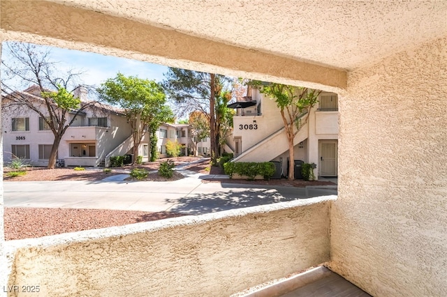 3060 Tarpon Dr Unit 104, Las Vegas, NV 89120 - balcony featuring a residential view and stairs