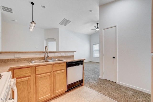5521 Jackpot Winner Ln Unit 101, Las Vegas, NV 89122 - kitchen with white dishwasher, arched walkways, light colored carpet, ceiling fan, and stove