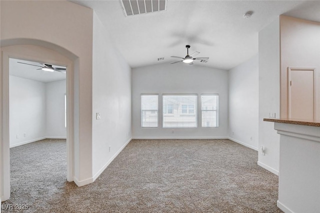 5521 Jackpot Winner Ln Unit 101, Las Vegas, NV 89122 - unfurnished living room with a ceiling fan, carpet floors, and lofted ceiling