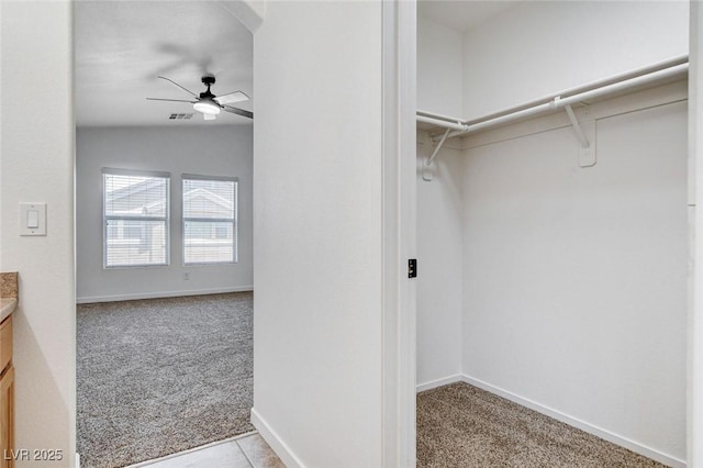 5521 Jackpot Winner Ln Unit 101, Las Vegas, NV 89122 - walk in closet with carpet flooring and a ceiling fan