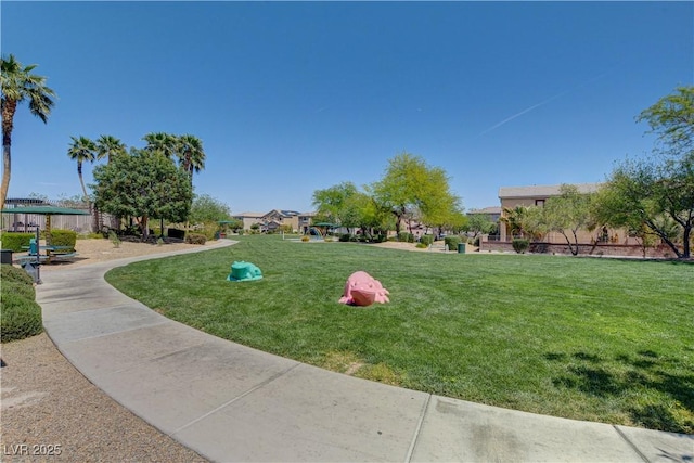 5521 Jackpot Winner Ln Unit 101, Las Vegas, NV 89122 - view of property's community featuring a yard