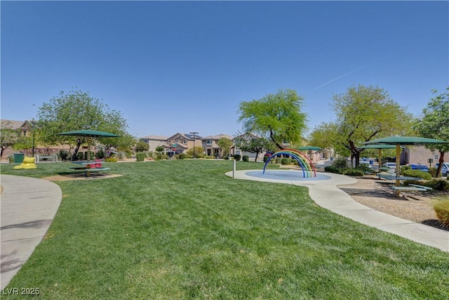 5521 Jackpot Winner Ln Unit 101, Las Vegas, NV 89122 - view of home's community featuring a lawn