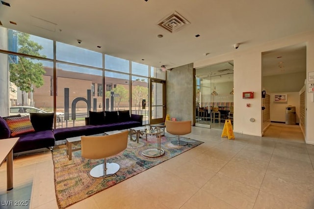 353 E Bonneville Ave Unit 313, Las Vegas, NV 89101 - building lobby featuring expansive windows and a security system
