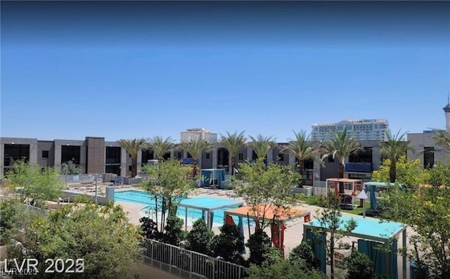 353 E Bonneville Ave Unit 313, Las Vegas, NV 89101 - community pool featuring a patio
