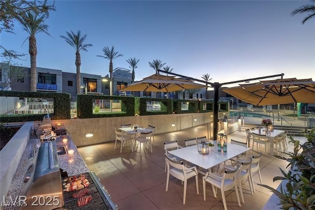 353 E Bonneville Ave Unit 313, Las Vegas, NV 89101 - view of patio / terrace featuring outdoor dining space