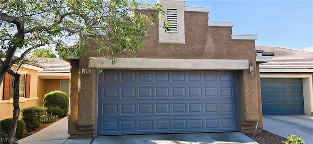 5045 Bayberry Crest St, North Las Vegas, NV 89031 - garage featuring concrete driveway