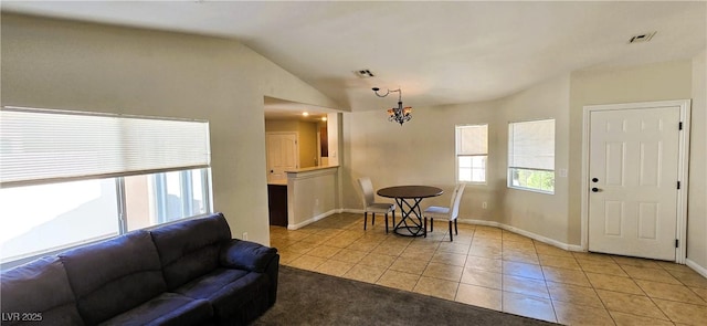 5045 Bayberry Crest St, North Las Vegas, NV 89031 - tiled living room featuring a chandelier and vaulted ceiling