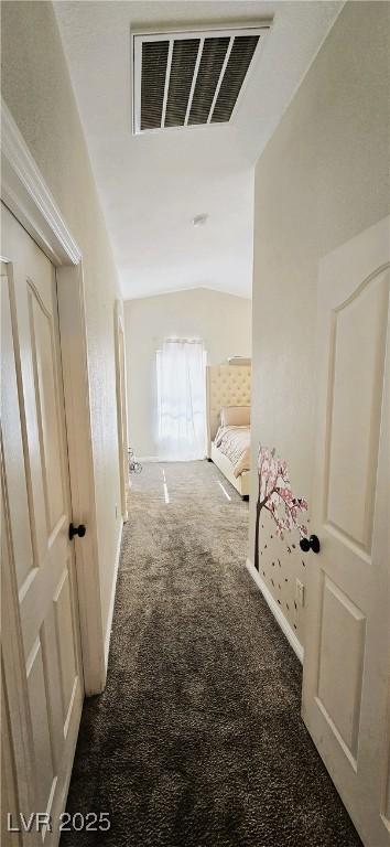 5045 Bayberry Crest St, North Las Vegas, NV 89031 - hallway with lofted ceiling and carpet floors