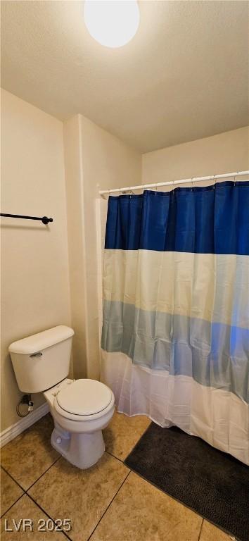 5045 Bayberry Crest St, North Las Vegas, NV 89031 - full bath featuring tile patterned flooring and curtained shower