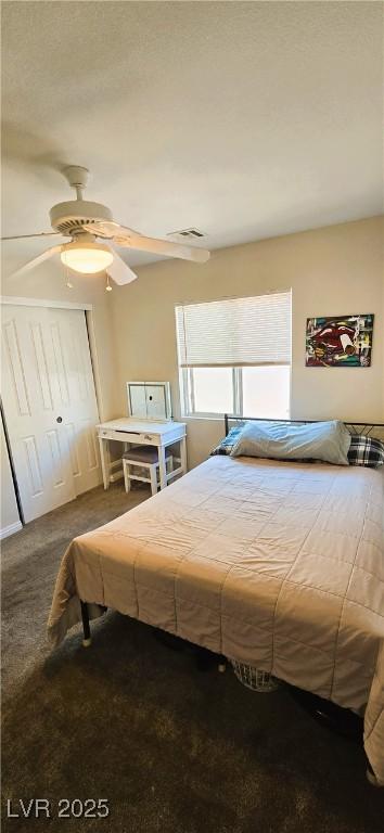 5045 Bayberry Crest St, North Las Vegas, NV 89031 - carpeted bedroom featuring a ceiling fan and a closet