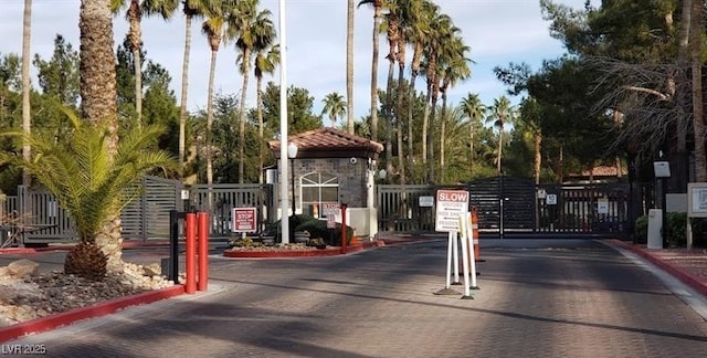 9000 Las Vegas Blvd Unit 1074, Las Vegas, NV 89123 - view of decorative road featuring curbs, a gated entry, and a gate