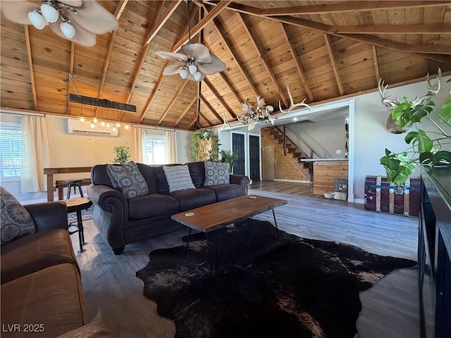 1829 Campton St, Ely, NV 89301 - living area featuring a wooden ceiling with exposed beams, a wall unit AC, a ceiling fan, wood finished floors, and stairway