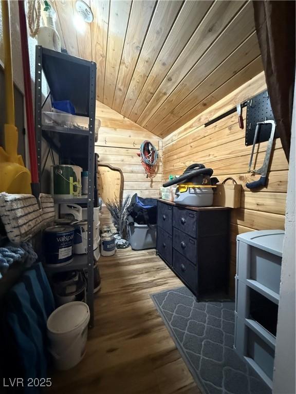 1829 Campton St, Ely, NV 89301 - bedroom with lofted ceiling, wood walls, wood finished floors, and wood ceiling