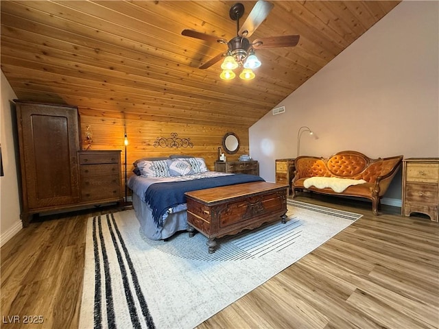1829 Campton St, Ely, NV 89301 - bedroom featuring lofted ceiling, wood finished floors, wood ceiling, ceiling fan, and wooden walls