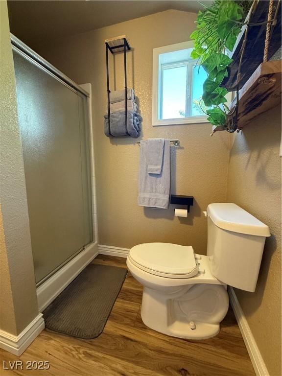 1829 Campton St, Ely, NV 89301 - full bathroom with wood finished floors and a stall shower