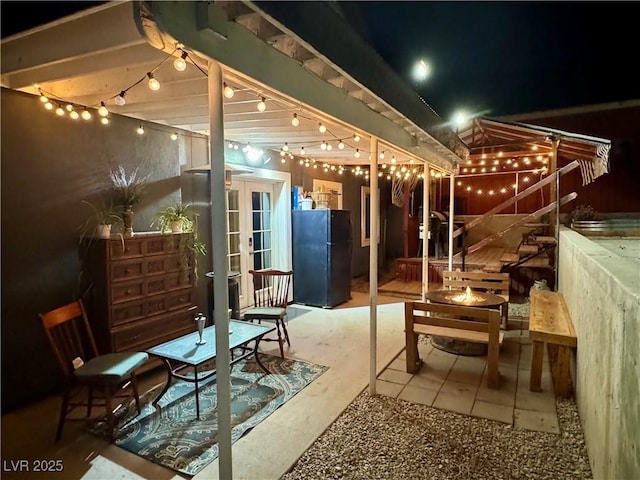 1829 Campton St, Ely, NV 89301 - patio at twilight with french doors and a patio area