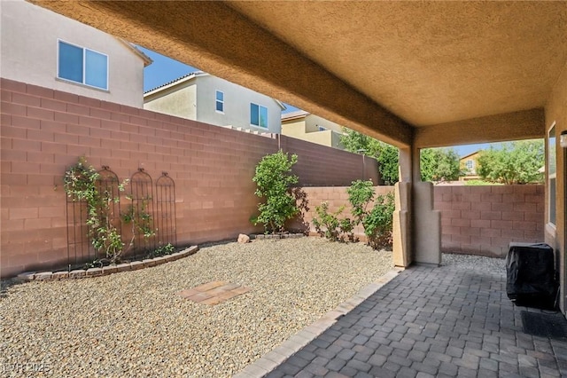 7407 Bakewell Ave, Las Vegas, NV 89179 - fenced backyard with a patio