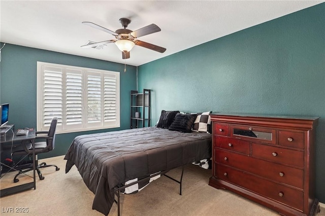 7407 Bakewell Ave, Las Vegas, NV 89179 - bedroom featuring carpet floors, a desk, a ceiling fan, and a textured wall