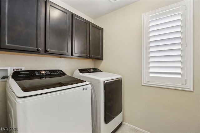 7407 Bakewell Ave, Las Vegas, NV 89179 - laundry room with washer and dryer and cabinet space