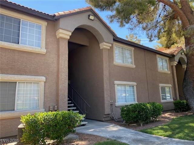 2750 S Durango Dr Unit 2141, Las Vegas, NV 89117 - property entrance featuring stucco siding and a tile roof