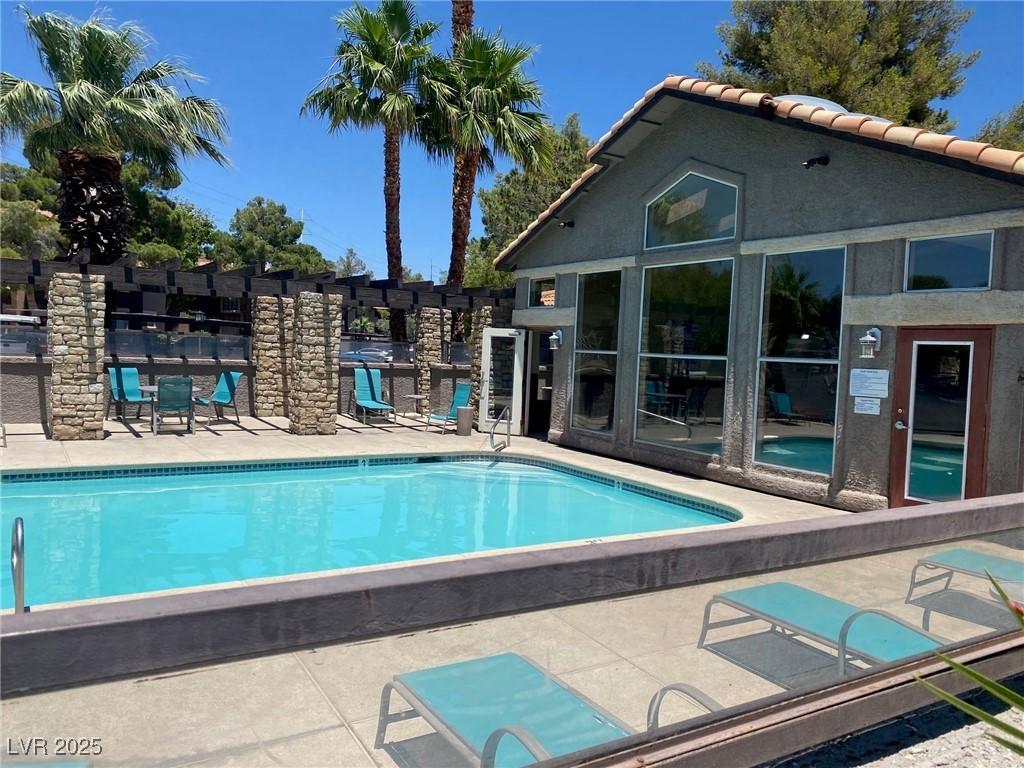 2750 S Durango Dr Unit 2141, Las Vegas, NV 89117 - community pool featuring a patio