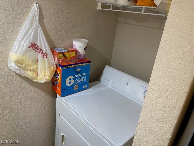2750 S Durango Dr Unit 2141, Las Vegas, NV 89117 - laundry room featuring washer / dryer and a textured wall