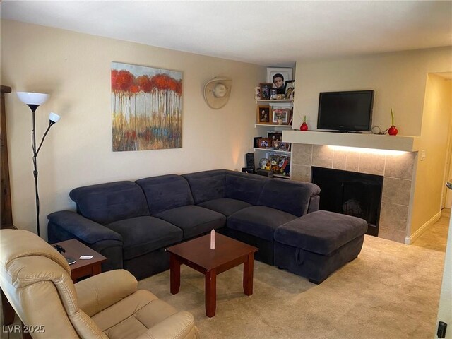 2750 S Durango Dr Unit 2141, Las Vegas, NV 89117 - living area with carpet flooring and a tile fireplace