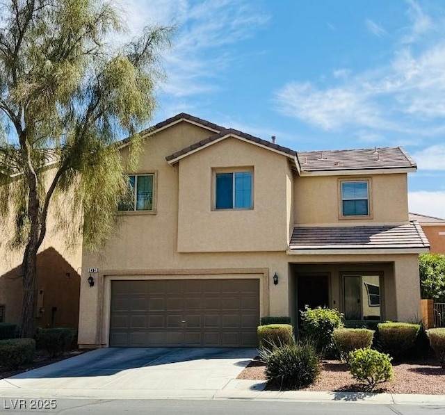 5484 Mercury Springs Dr, Las Vegas, NV 89122 - view of front of house featuring concrete driveway, a garage, stucco siding, and a tiled roof