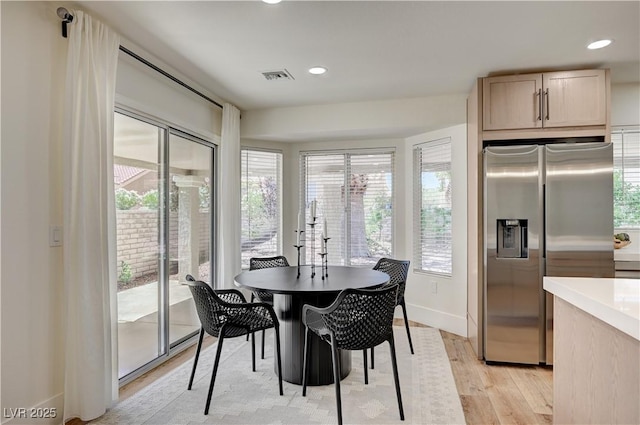 8813 Sundial Dr, Las Vegas, NV 89134 - dining area featuring light wood-type flooring and recessed lighting