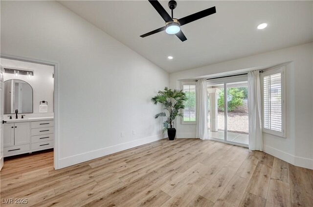 8813 Sundial Dr, Las Vegas, NV 89134 - empty room featuring ceiling fan, light wood-style floors, high vaulted ceiling, and recessed lighting