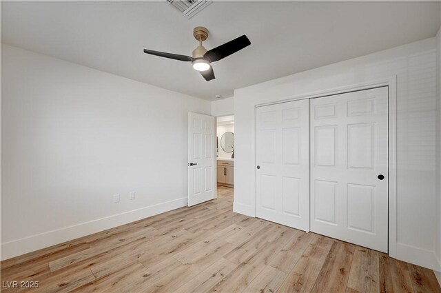 8813 Sundial Dr, Las Vegas, NV 89134 - unfurnished bedroom featuring light wood-style flooring, a closet, and ceiling fan