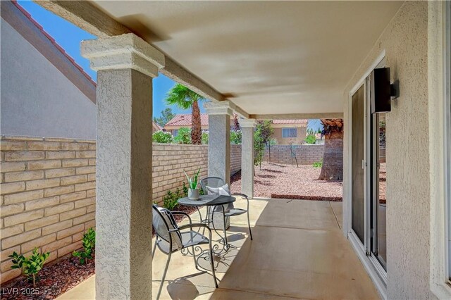 8813 Sundial Dr, Las Vegas, NV 89134 - fenced backyard featuring a patio area