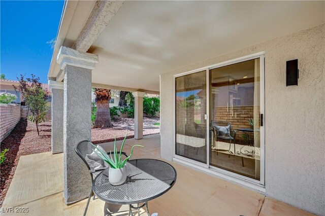 8813 Sundial Dr, Las Vegas, NV 89134 - fenced backyard featuring a patio