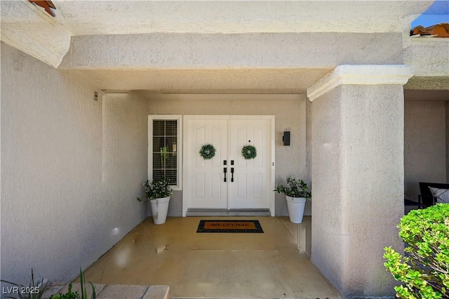 8813 Sundial Dr, Las Vegas, NV 89134 - property entrance featuring stucco siding