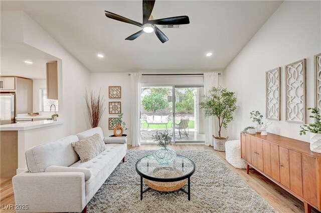 8813 Sundial Dr, Las Vegas, NV 89134 - living area with light wood-style floors, ceiling fan, and recessed lighting