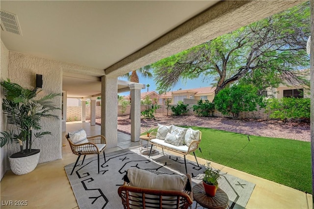 8813 Sundial Dr, Las Vegas, NV 89134 - fenced backyard with a patio area