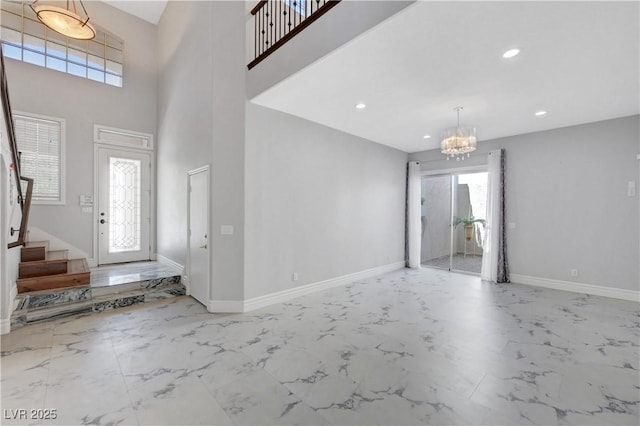 3079 Evening Mist Ave, Henderson, NV 89052 - entryway featuring marble finish flooring, stairway, a chandelier, and recessed lighting