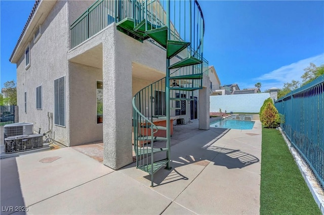 3079 Evening Mist Ave, Henderson, NV 89052 - fenced backyard featuring stairway and a patio area