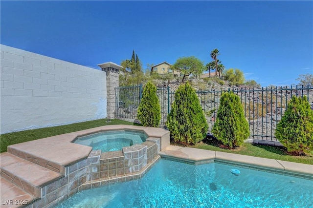 3079 Evening Mist Ave, Henderson, NV 89052 - view of pool featuring an in-ground hot tub and a fenced backyard