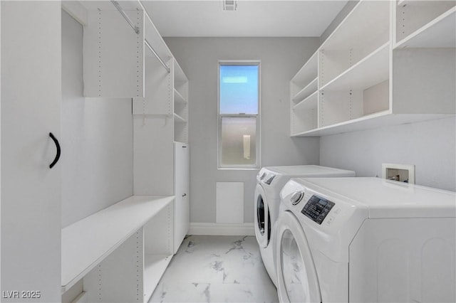 3079 Evening Mist Ave, Henderson, NV 89052 - laundry room with light marble finish floors and separate washer and dryer