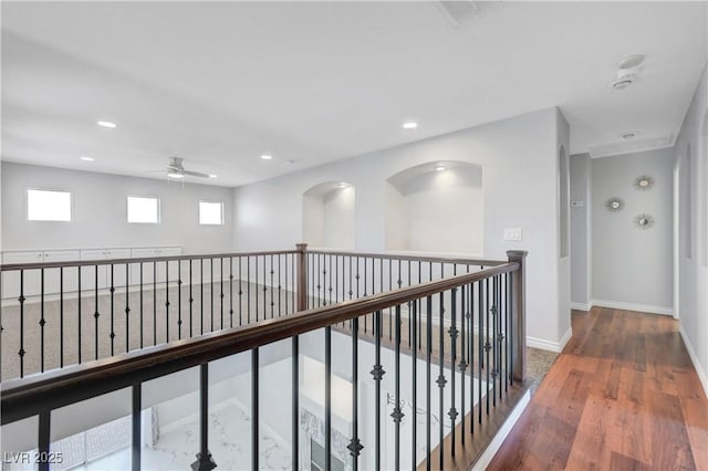 3079 Evening Mist Ave, Henderson, NV 89052 - hallway with wood finished floors, recessed lighting, and an upstairs landing