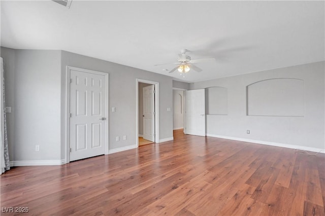 3079 Evening Mist Ave, Henderson, NV 89052 - unfurnished bedroom with wood finished floors and ceiling fan