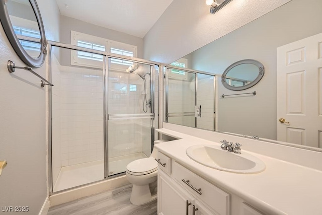 6103 Sundown Crest St, Las Vegas, NV 89113 - full bathroom with a stall shower, vanity, and wood finished floors