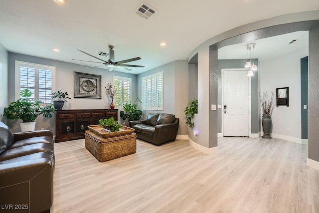 6103 Sundown Crest St, Las Vegas, NV 89113 - living room featuring plenty of natural light, light wood-style floors, recessed lighting, ceiling fan, and arched walkways