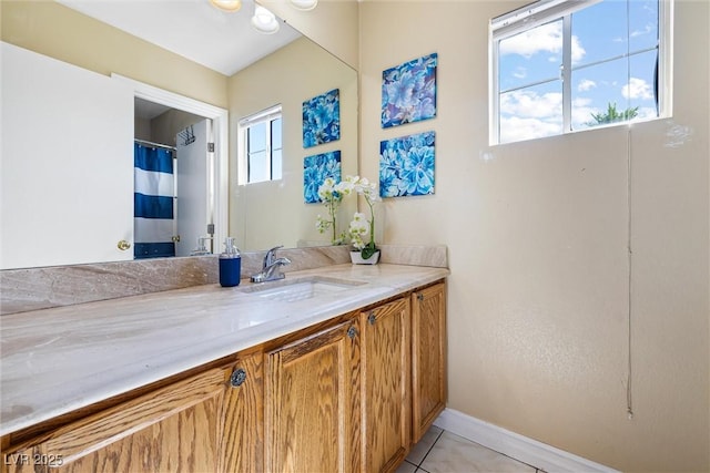 5967 Aimless St, Henderson, NV 89011 - bathroom with vanity and tile patterned floors