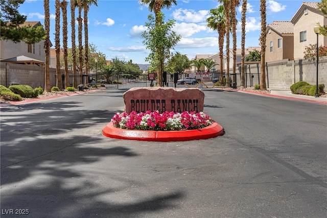 5967 Aimless St, Henderson, NV 89011 - view of asphalt street featuring a residential view, a gate, and a gated entry