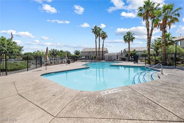 5967 Aimless St, Henderson, NV 89011 - community pool with a patio area