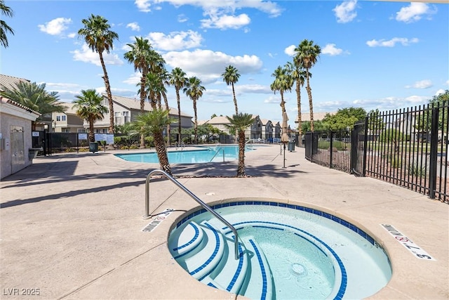 5967 Aimless St, Henderson, NV 89011 - community pool with a hot tub, a patio, and a residential view