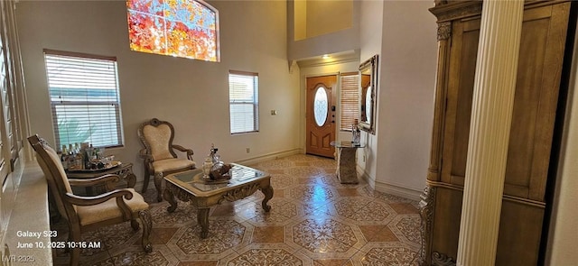 6275 Allspice Ct, Las Vegas, NV 89142 - foyer featuring light tile patterned flooring and a towering ceiling